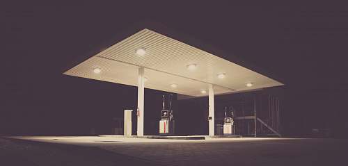 pump gasoline station during night time gas pump